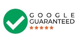 A green circle with a white check mark, the words “Google Guaranteed,” and five orange stars beneath the text.